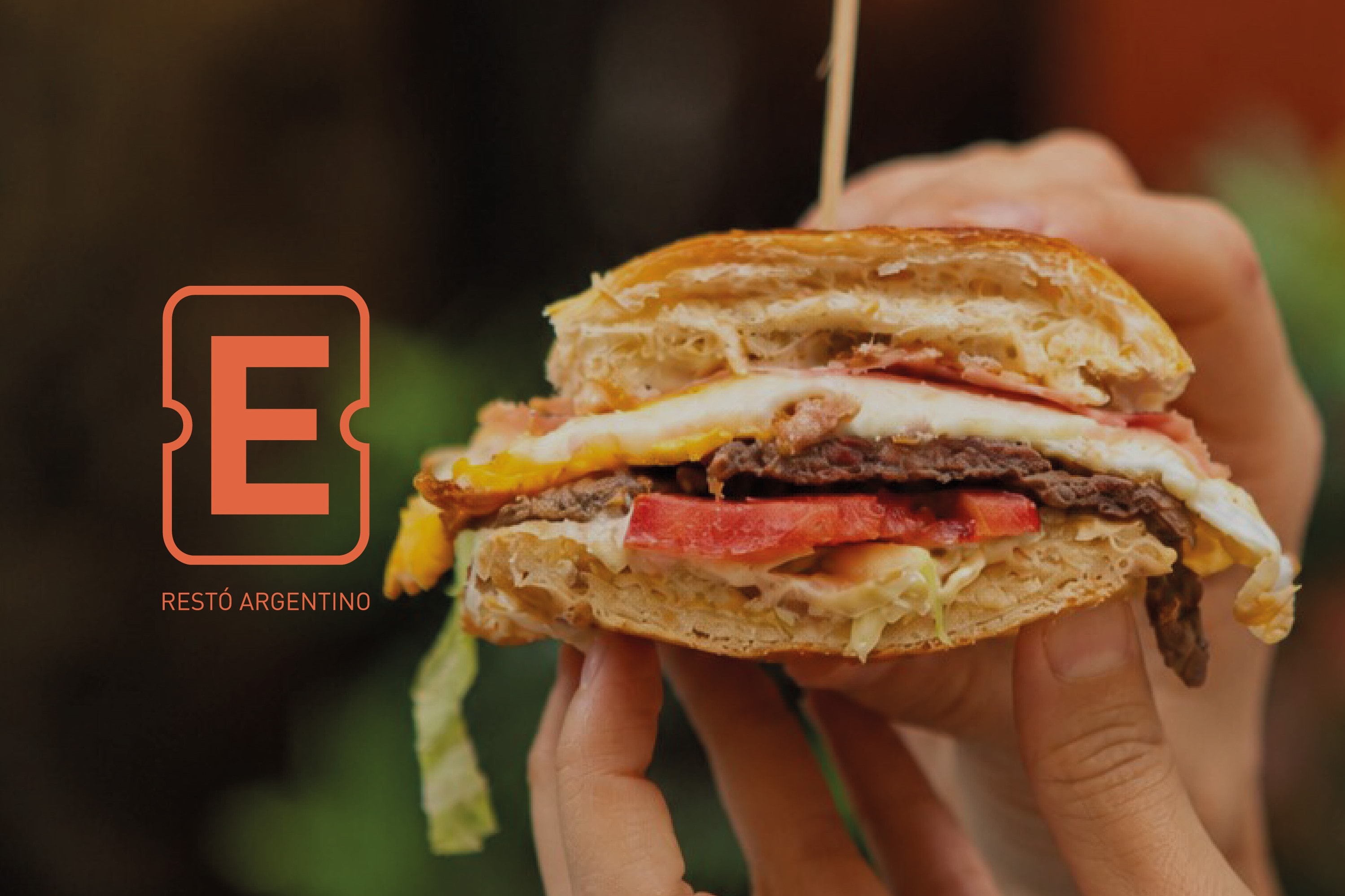 El símbolo E de Estación Cero, restó argentino, junto a un sándwich